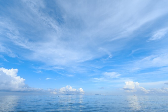 Summer seascape with blue sky background